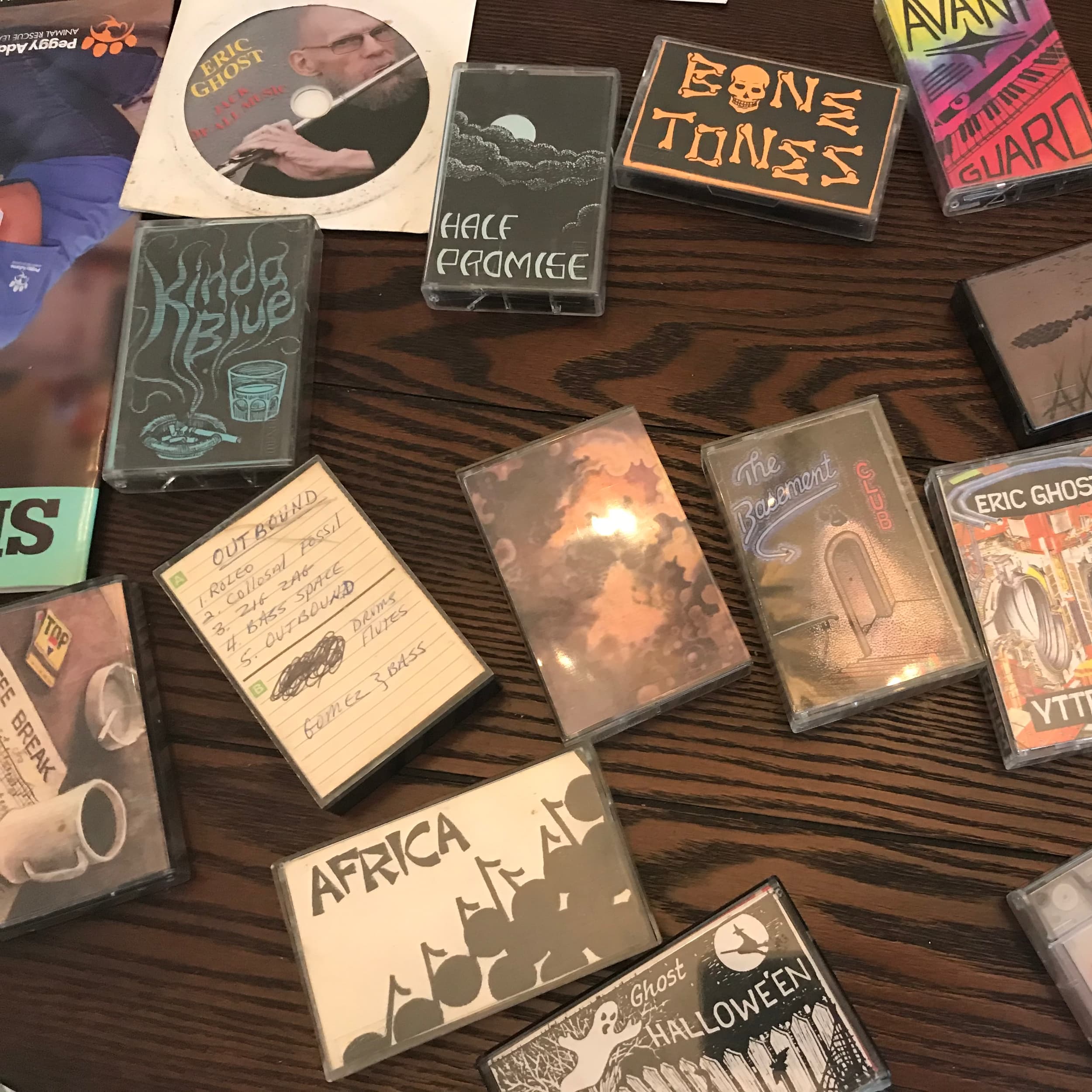 Cassette tapes of Richard Sanders's flute recordings arranged on a table